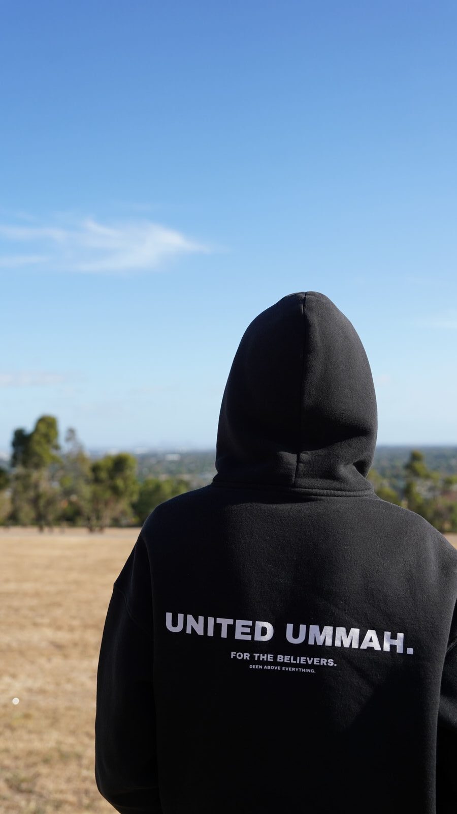 United Ummah Hoodie in black — worn